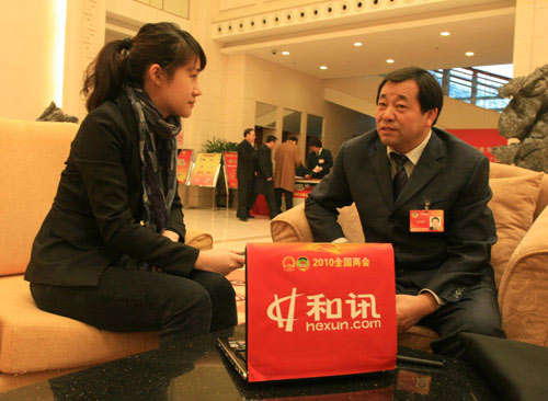 全國政協(xié)委員、甘肅省工商聯(lián)副主席、盛達集團董事長趙滿堂(圖右)
